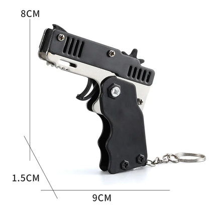 1PC Mini Toy Metal Gun with Rubber Band Fun Folding Pistol Key Charm Pendant Kids Birthday Gifts Toys Boy Girl Game Party Favors